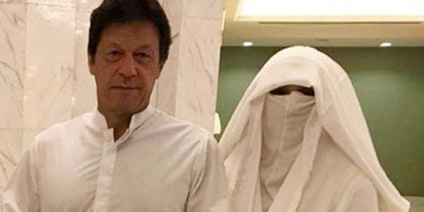 bushra bibi and imran khan in white dress