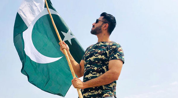 Mustafa zahid with Pakistani flag